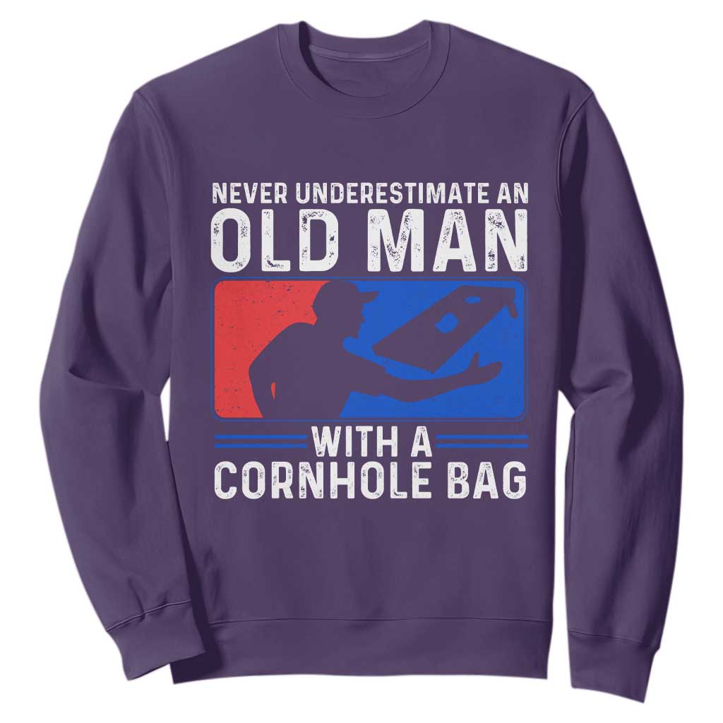 Funny Cornhole Player Sweatshirt Never Underestimate An Old Man With A Cornhole Bag TS10 Purple Print Your Wear