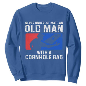 Funny Cornhole Player Sweatshirt Never Underestimate An Old Man With A Cornhole Bag TS10 Royal Blue Print Your Wear