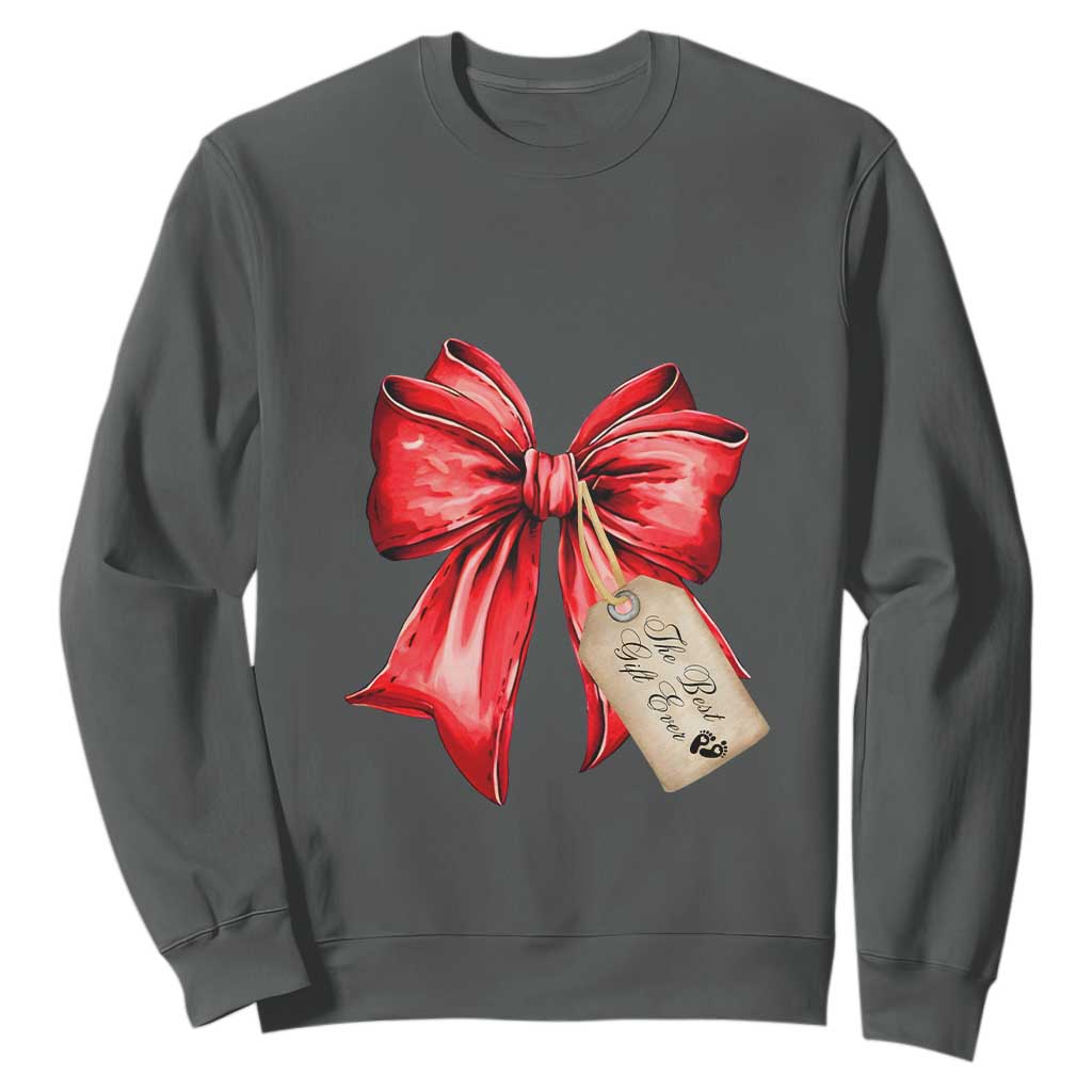 Christmas Pregnancy Announcement Sweatshirt Coquette Bow Xmas Maternity Gift TS10 Dark Heather Print Your Wear