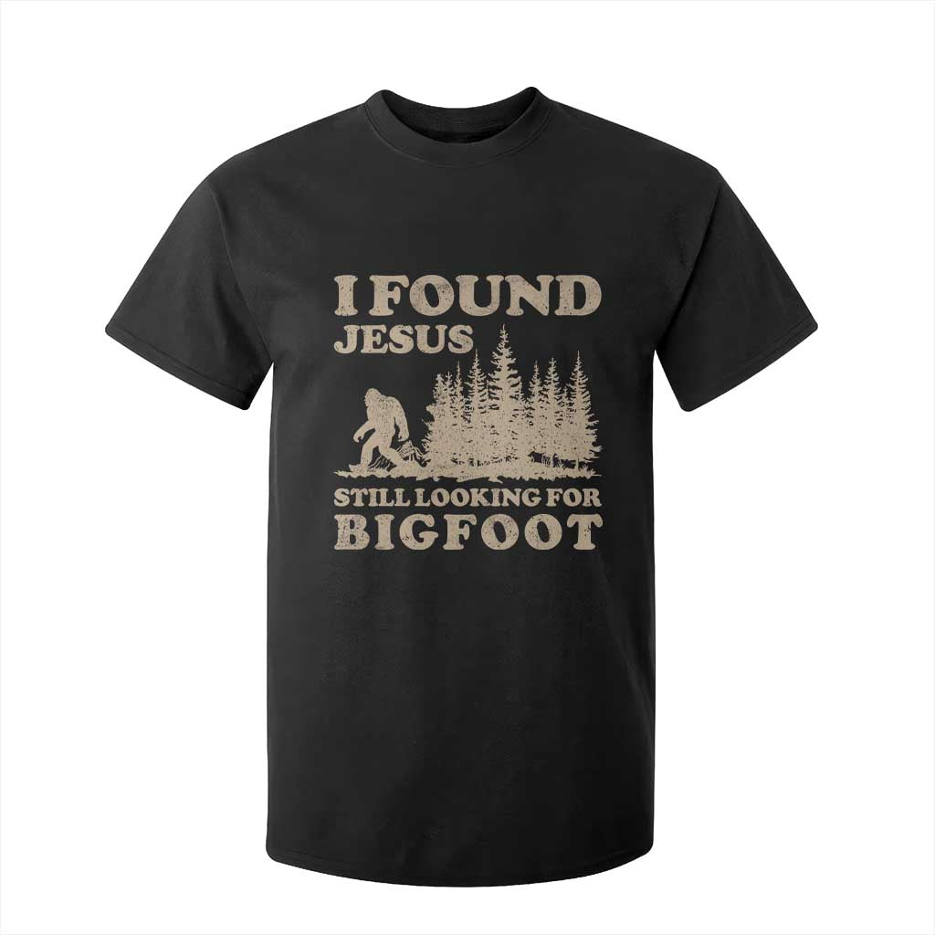 Retro I Found Jesus Still Looking For Bigfoot T Shirt For Kid Vintage Sasquatch Believer Funny Christian Humor TS10 Black Print Your Wear
