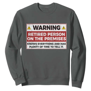 Funny Retirement Sweatshirt Warning A Retired Person On The Premises Knows Everything TS10 Dark Heather Print Your Wear