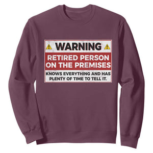 Funny Retirement Sweatshirt Warning A Retired Person On The Premises Knows Everything TS10 Maroon Print Your Wear