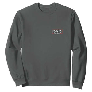 New Dad 2026 Sweatshirt First Fathers Day Promoted To Daddy Est 2026 TS10 Dark Heather Print Your Wear