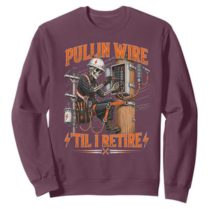 Electrician Lineman Skeleton Graphic Sweatshirt Pullin Wire Til I Retire TS10 Maroon Print Your Wear