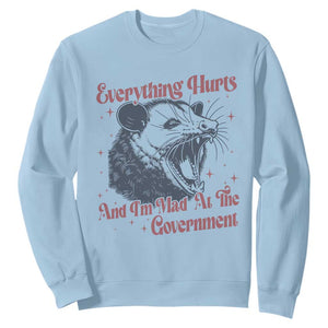 Everything Hurts And I Am Mad At The Government Sweatshirt Funny Burnout Possum TS11 Light Blue Print Your Wear