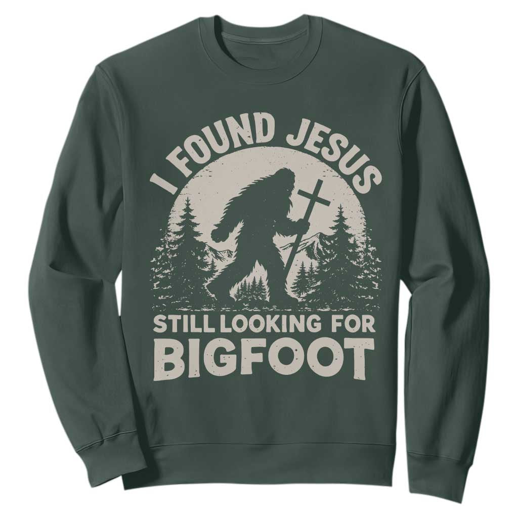 I Found Jesus Still Looking For Bigfoot Sweatshirt Funny Christian Sasquatch Forest TS11 Dark Forest Green Print Your Wear