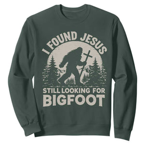 I Found Jesus Still Looking For Bigfoot Sweatshirt Funny Christian Sasquatch Forest TS11 Dark Forest Green Print Your Wear