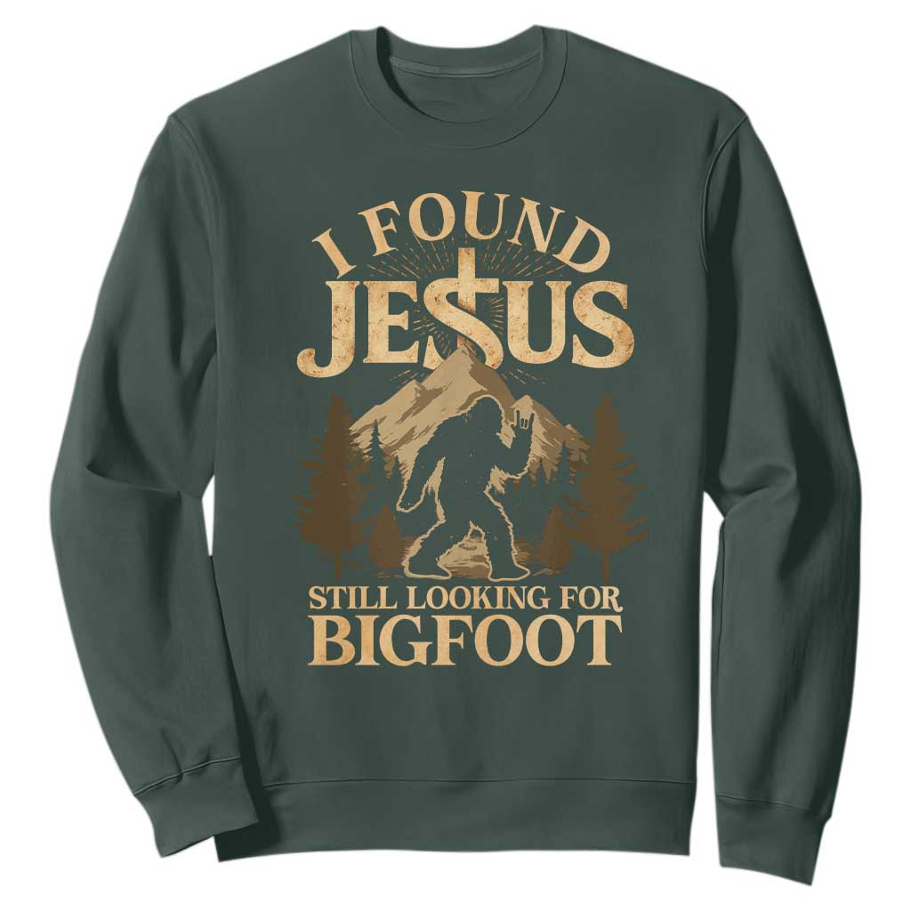 I Found Jesus Still Looking For Bigfoot Sweatshirt Funny Christian Sasquatch Vintage Mountain TS11 Dark Forest Green Print Your Wear