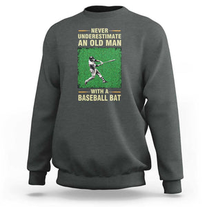 Funny Baseball Sweatshirt Never Underestimate An Old Man With A Baseball Bat TS11 Dark Heather Print Your Wear