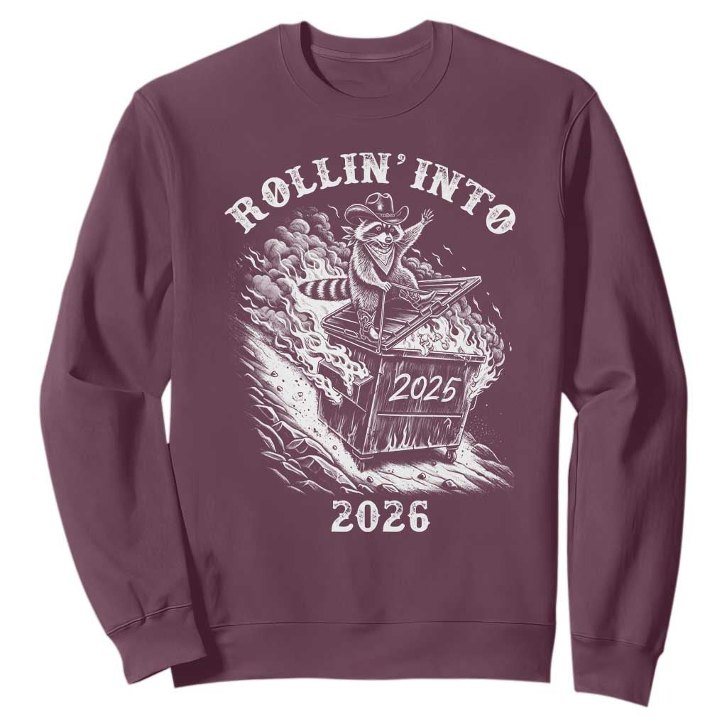 Funny Cowboy Raccoon Rollin Into 2026 Sweatshirt New Year Dumpster Fire 2026 Rodeo TS11 Maroon Print Your Wear