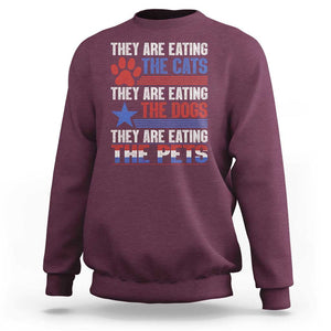 Funny Trump Supporter 2024 Sweatshirt They're Eating The Cats They're Eating The Dogs They're Eating The Pets Paw Star TS11 Maroon Print Your Wear