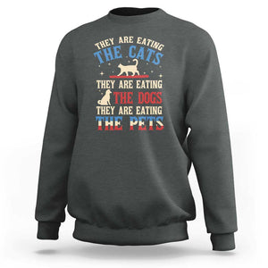 Funny Trump Supporter 2024 Sweatshirt They Are Eating The Cats They Are Eating The Dogs They Are Eating The Pets TS11 Dark Heather Print Your Wear