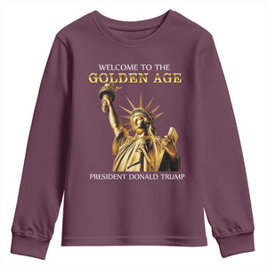 Funny Trump 2025 Welcome To The Golden Age Youth Sweatshirt Golden Statue Of Liberty TS11 Maroon Print Your Wear