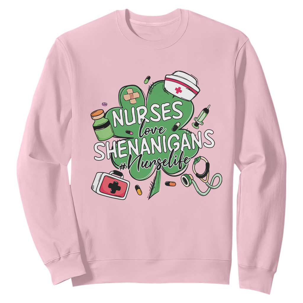 Funny St Patrick's Day Nurse Sweatshirt Nurses Love Shenanigans Nurse Life Shamrock TS11 Light Pink Print Your Wear