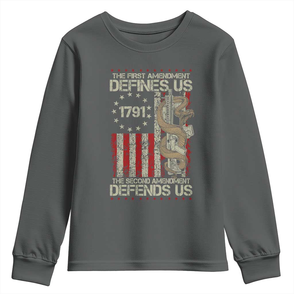 The First Amendment Defines Us The Second Defend Us Youth Sweatshirt Vintage American Flag TS11 Dark Heather Print Your Wear