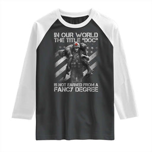 Combat Medic Raglan Shirt In Our World The Title Doc Is Not Earned Form A Fancy Degree TS11 Black White Print Your Wear