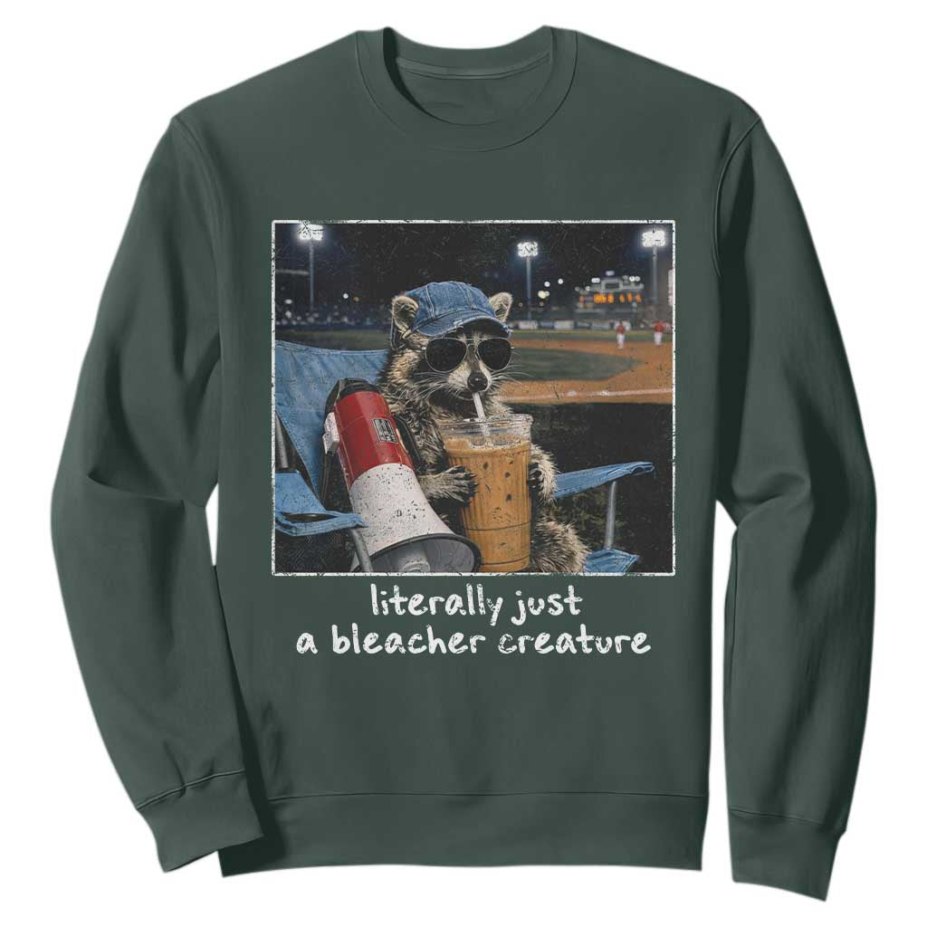 Baseball Raccoon Literally Just a Bleacher Creature Sweatshirt Funny Trash Panda Drinking Iced Coffee Ballfield TS11 Dark Forest Green Print Your Wear