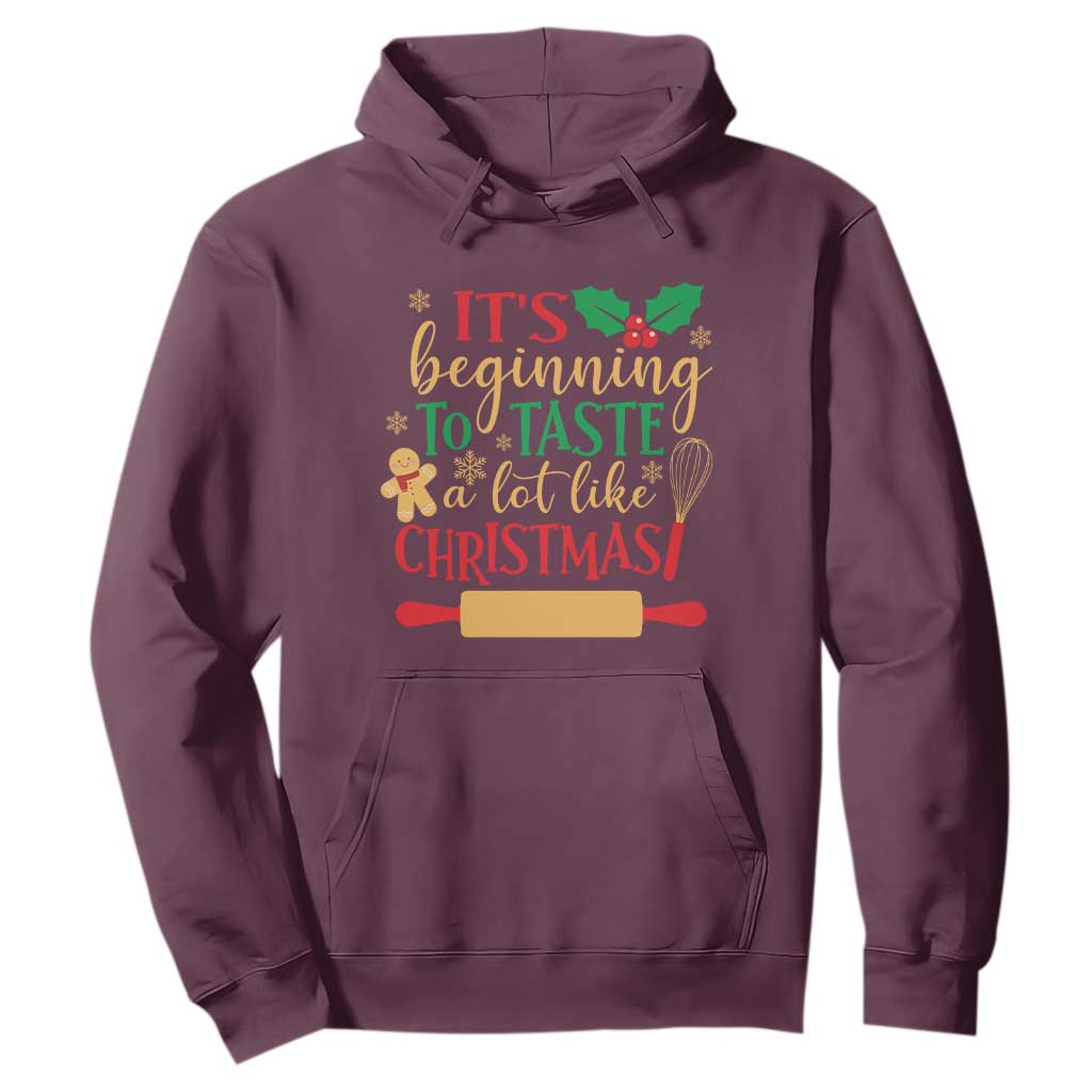 Funny Christmas Baker Hoodie It's Beginning To Taste A Lot Like Christmas Gingerbread TS11 Maroon Print Your Wear