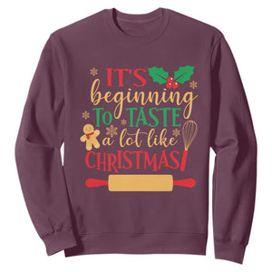 Funny Christmas Baker Sweatshirt It's Beginning To Taste A Lot Like Christmas Gingerbread TS11 Maroon Print Your Wear