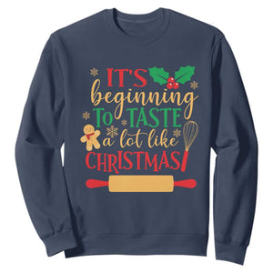 Funny Christmas Baker Sweatshirt It's Beginning To Taste A Lot Like Christmas Gingerbread TS11 Navy Print Your Wear