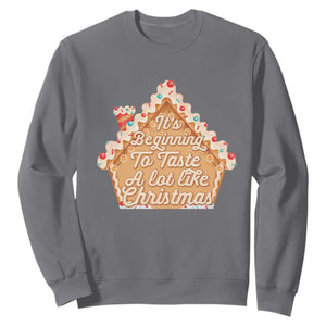 Funny Christmas Cookie Baking Sweatshirt It's Beginning To Taste A Lot Like Christmas Gingerbread House TS11 Charcoal Print Your Wear