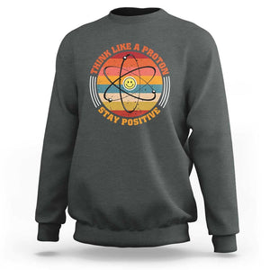 Chemistry Science Sweatshirt Think Like A Proton Stay Positive Retro Elements TS11 Dark Heather Print Your Wear