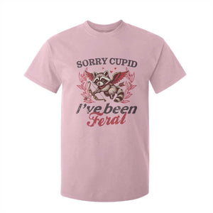 Funny Sorry Cupid I've Been Feral T Shirt For Kid Valentine's Day Cupid Racoon TS11 Light Pink Print Your Wear