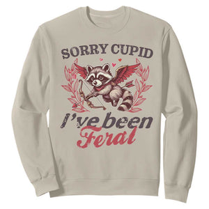 Funny Sorry Cupid I've Been Feral Sweatshirt Valentine's Day Cupid Racoon TS11 Sand Print Your Wear