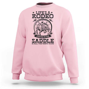 Western Cowboy Sweatshirt Life's A Rodeo Staying In The Saddle Is All You Have To Do TS11 Light Pink Print Your Wear