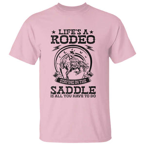 Western Cowboy T Shirt Life's A Rodeo Staying In The Saddle Is All You Have To Do TS11 Light Pink Print Your Wear