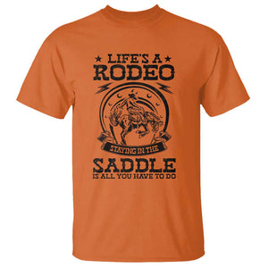 Western Cowboy T Shirt Life's A Rodeo Staying In The Saddle Is All You Have To Do TS11 Orange Print Your Wear