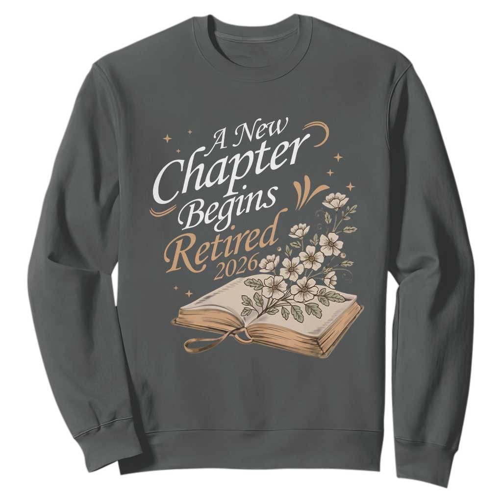 A New Chapter Begins Retired 2026 Sweatshirt Retired Teacher Floral Book TS11 Dark Heather Print Your Wear