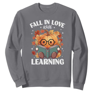 Funny Teacher Sweatshirt Fall In Love With Learning Autumn Pumpkin Reading Thanksgiving Pumpkin TS11 Charcoal Print Your Wear