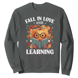 Funny Teacher Sweatshirt Fall In Love With Learning Autumn Pumpkin Reading Thanksgiving Pumpkin TS11 Dark Heather Print Your Wear