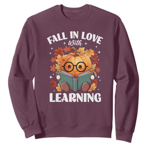 Funny Teacher Sweatshirt Fall In Love With Learning Autumn Pumpkin Reading Thanksgiving Pumpkin TS11 Maroon Print Your Wear