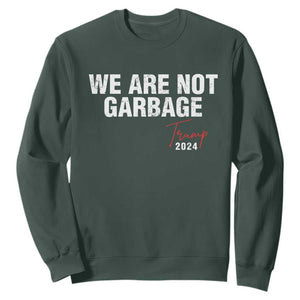 Funny Trump Garbage Sweatshirt We're Not Garbage Trump 2024 TS11 Dark Forest Green Print Your Wear