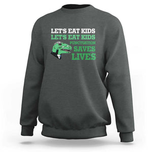 Funny Teacher Sweatshirt Let's Eat Kids Punctuation Saves Lives Dinosaur TS11 Dark Heather Print Your Wear