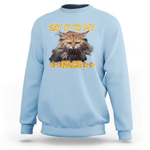 Funny Say It To My Face Sweatshirt Angry Orange Cat Kamala For President TS11 Light Blue Print Your Wear