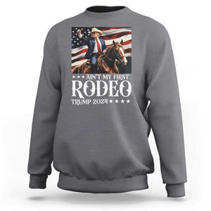 Funny Ain't My First Rodeo Trump 2024 Sweatshirt Western Cowboy American Flag TS11 Charcoal Print Your Wear