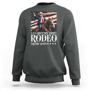 Funny Ain't My First Rodeo Trump 2024 Sweatshirt Western Cowboy American Flag TS11 Dark Heather Print Your Wear