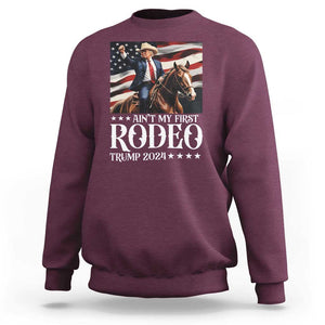 Funny Ain't My First Rodeo Trump 2024 Sweatshirt Western Cowboy American Flag TS11 Maroon Print Your Wear