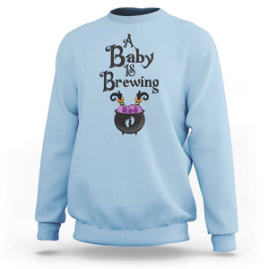 Funny Halloween Pregnancy Announcement Sweatshirt A Baby Is Brewing Witch Cauldron Footprint Pregnant Baby TS11 Light Blue Print Your Wear