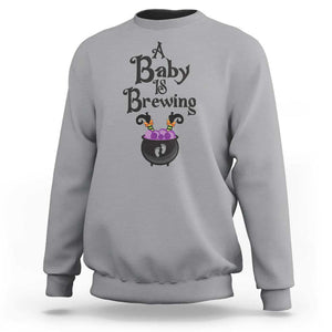 Funny Halloween Pregnancy Announcement Sweatshirt A Baby Is Brewing Witch Cauldron Footprint Pregnant Baby TS11 Sport Gray Print Your Wear