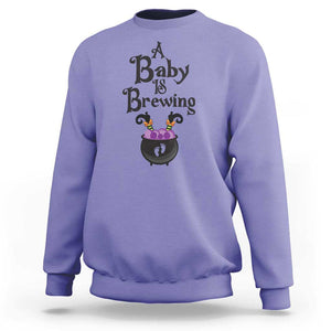 Funny Halloween Pregnancy Announcement Sweatshirt A Baby Is Brewing Witch Cauldron Footprint Pregnant Baby TS11 Violet Print Your Wear