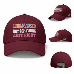 Funny Relatable Saying Baseball Cap Undiagnosed But Something Aint Right TS12 Baseball Cap Universal Fit Maroon Print Your Wear