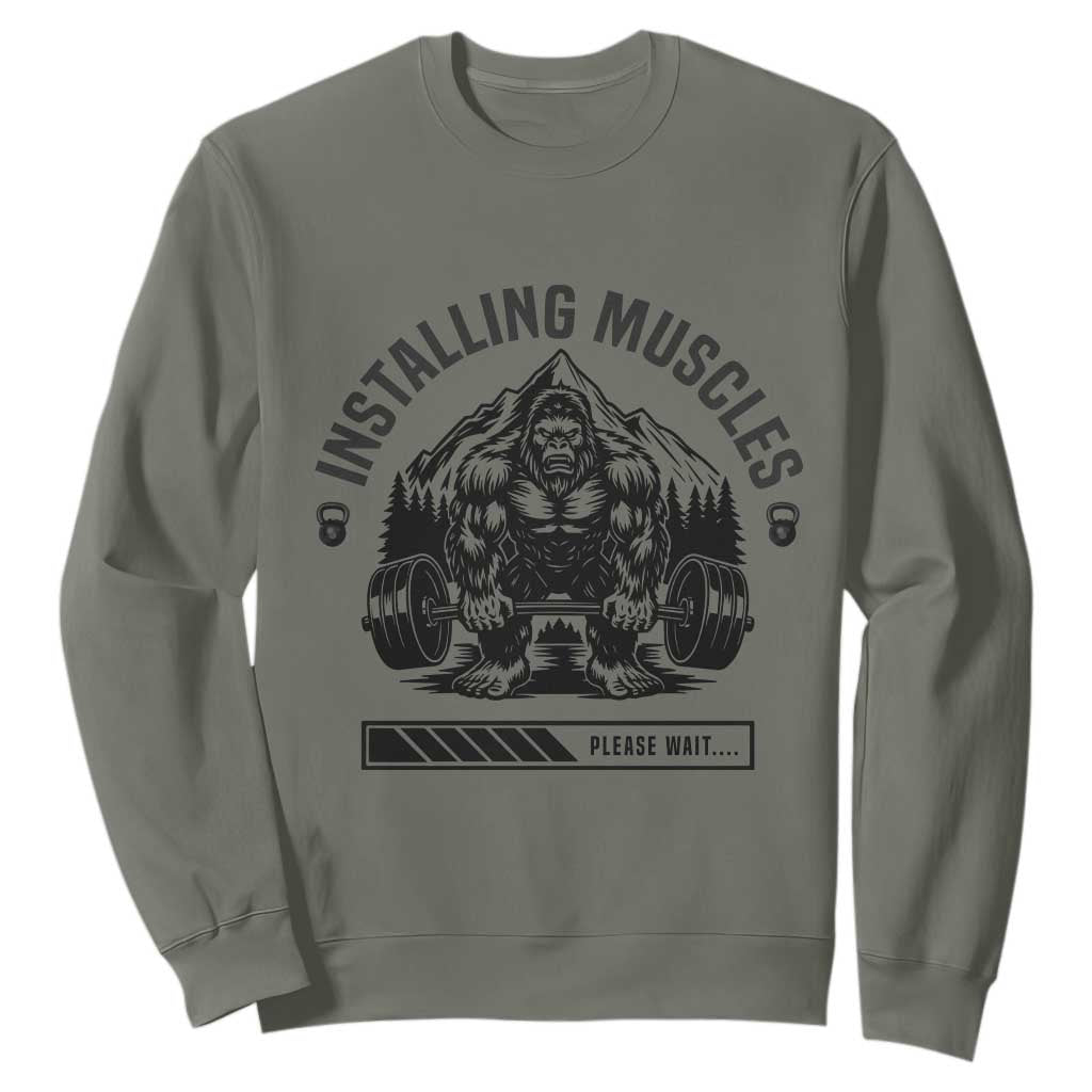 Installing Muscles Please Wait Sweatshirt Bigfoot Funny Gym Workout Gift TS12 Military Green Print Your Wear