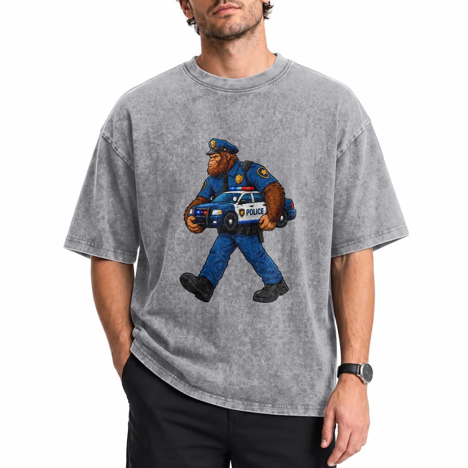 Funny Bigfoot Police Law Enforcement Washed Cotton T-Shirt Carrying Patrol Car Cryptid