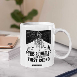 Funny Skeleton Cowboy This Actually Is My First Rodeo Coffee Mug Spooky Western Halloween Rodeo Gift
