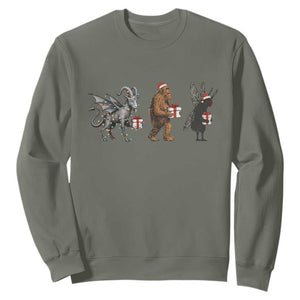 Christmas Cryptid Gift Sweatshirt Bigfoot Jersey Devil Mothman Santa TS12 Military Green Print Your Wear
