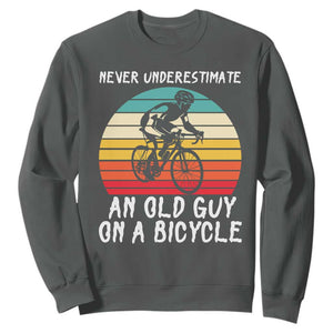 Never Underestimate An Old Guy On A Bicycle Sweatshirt Cycling Lover Gift TS12 Dark Heather Print Your Wear